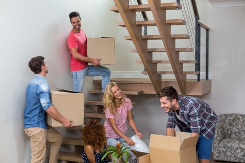 Commercial moving team organizing office relocation in Maidavale
