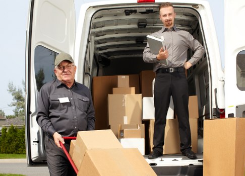 Professional house removalists in Maidavale loading furniture into a moving truck
