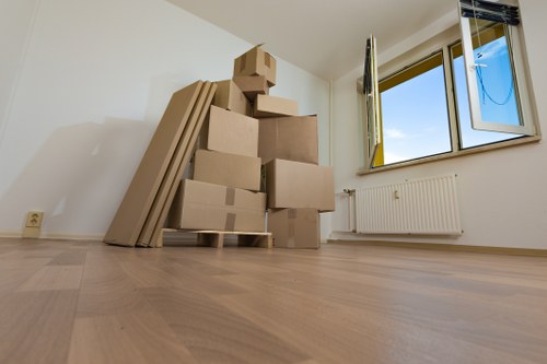 Student settling into a new room after removals in Maidavale