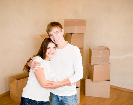 Staff handling furniture carefully during a planned removal service