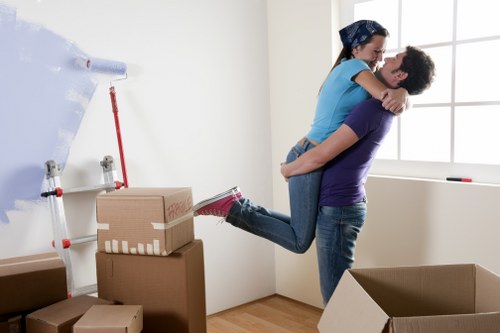 Packed moving boxes prepared for removals in Maidavale