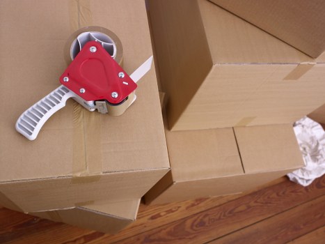 Maidavale movers assisting with careful transport of household items