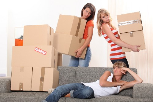 Staff preparing labeled boxes for a Maidavale commercial move