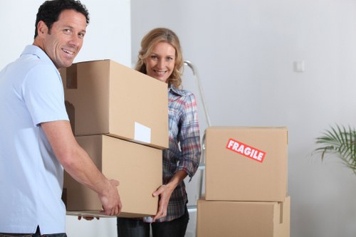 Loading furniture into a removal van in Maidavale