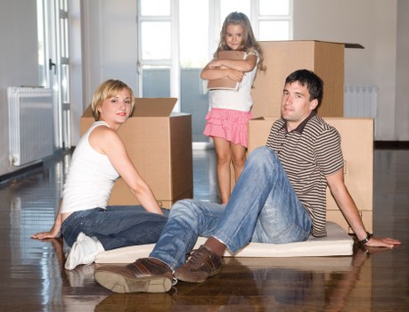 Removals team handling furniture during house removals in Maidavale